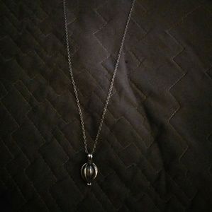 Silver necklace with pearl in cage